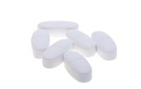 white pills isolated on white background